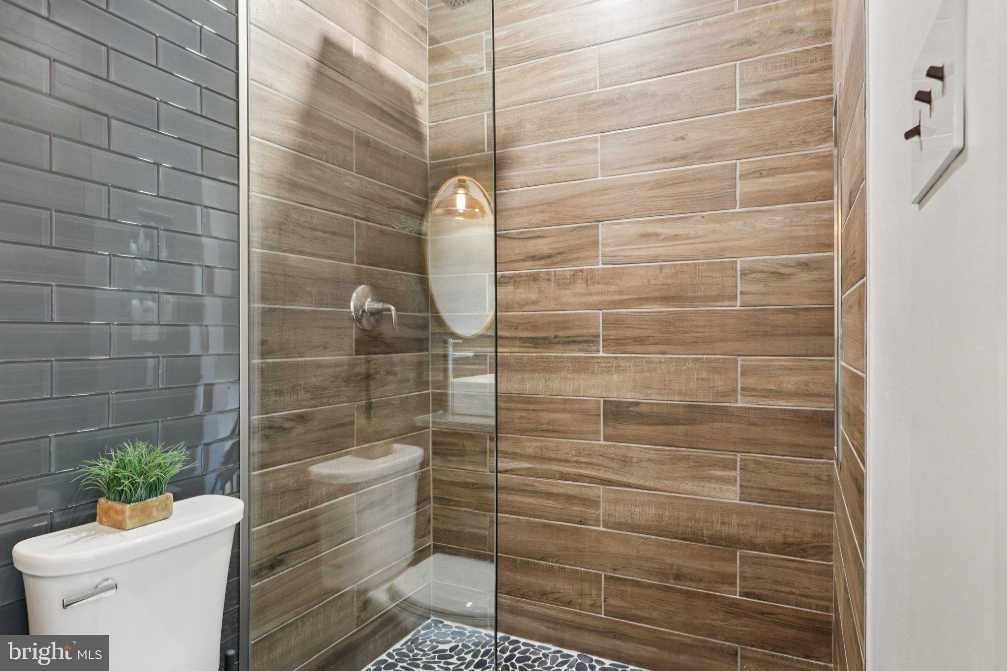 6 Avignon Devon, PA 19333 - Photo 39 of 61 a bathroom with a toilet and a shower