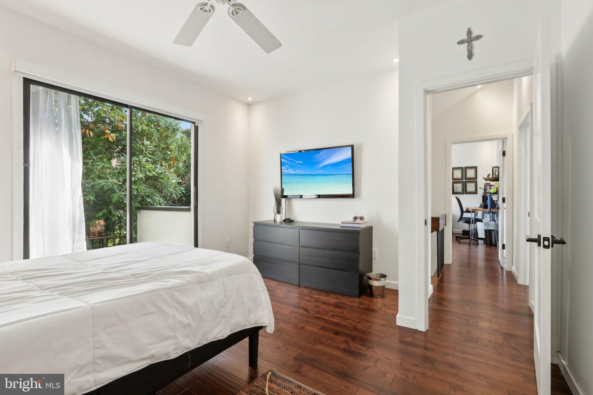 6 Avignon Devon, PA 19333 - Photo 40 of 61 a bedroom with a bed and a table