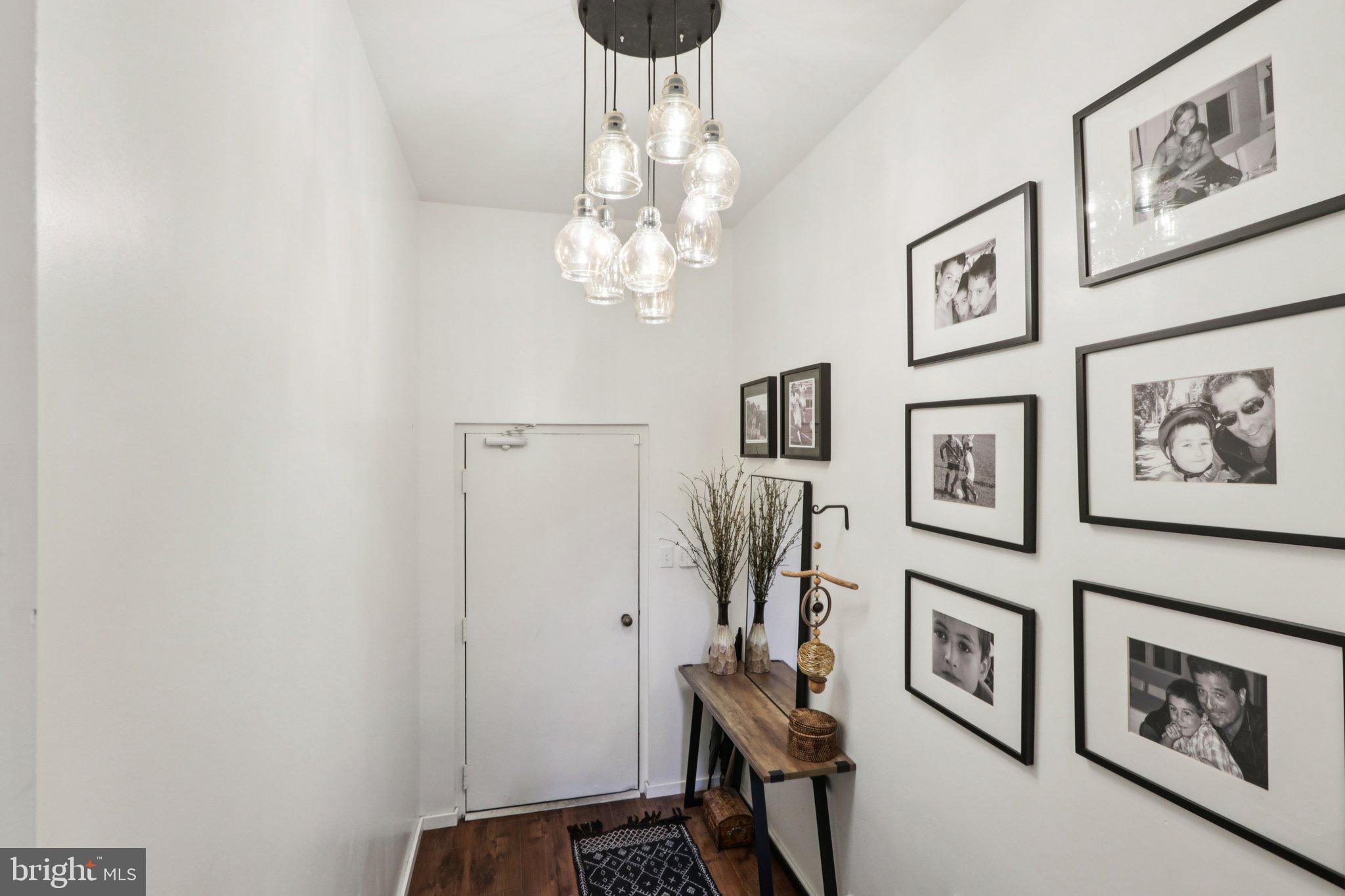 6 Avignon Devon, PA 19333 - Photo 44 of 61 a view of a hallway with furniture