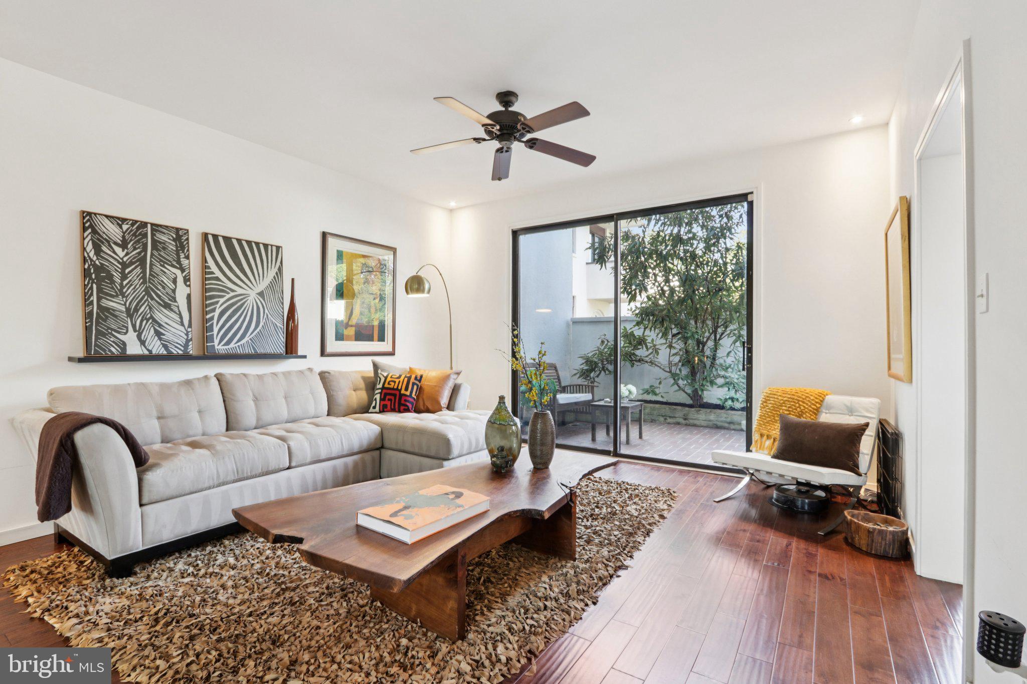 6 Avignon Devon, PA 19333 - Photo 8 of 61 a living room with furniture and a large window