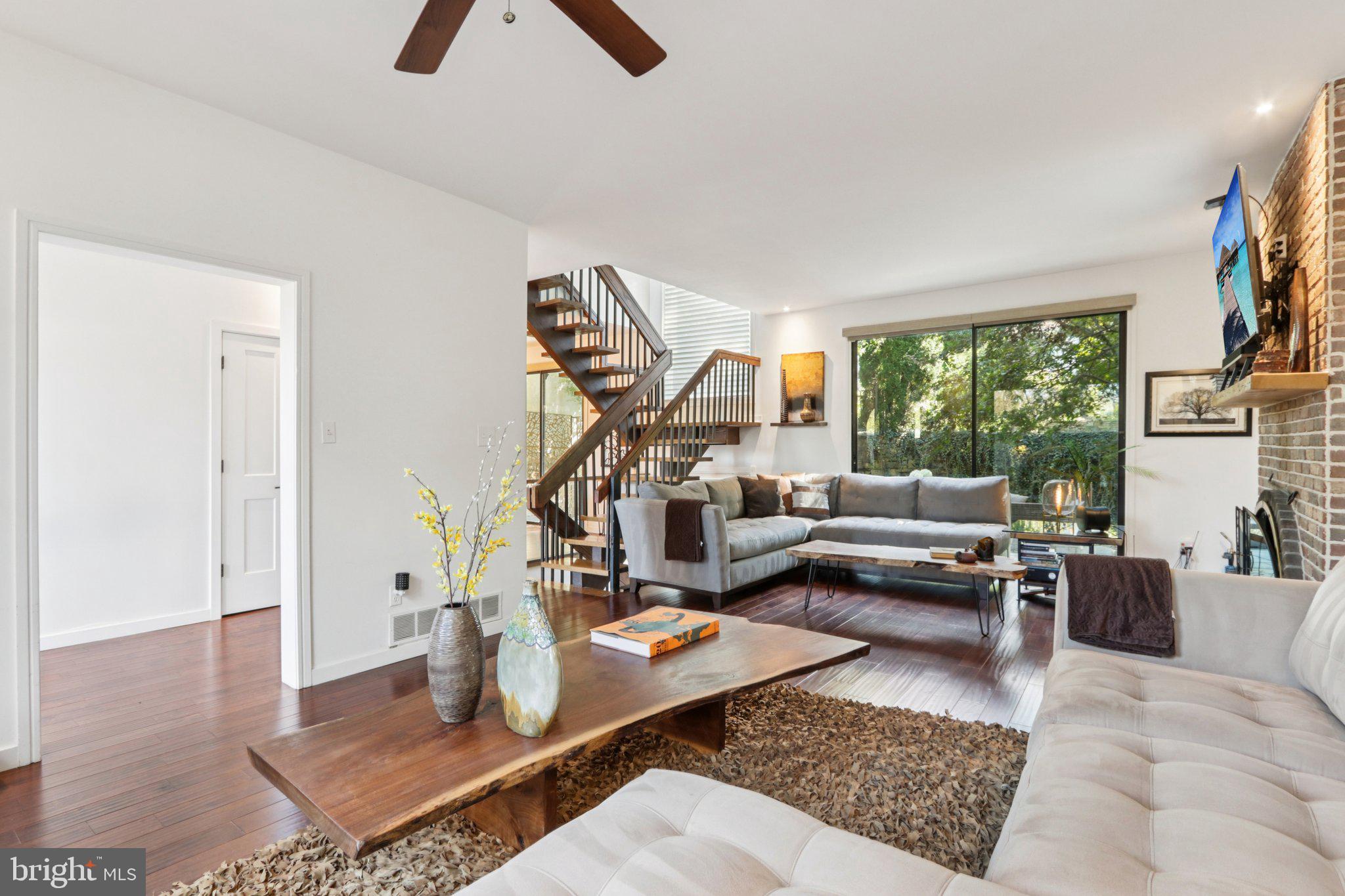 6 Avignon Devon, PA 19333 - Photo 10 of 61 a living room with furniture and a potted plant