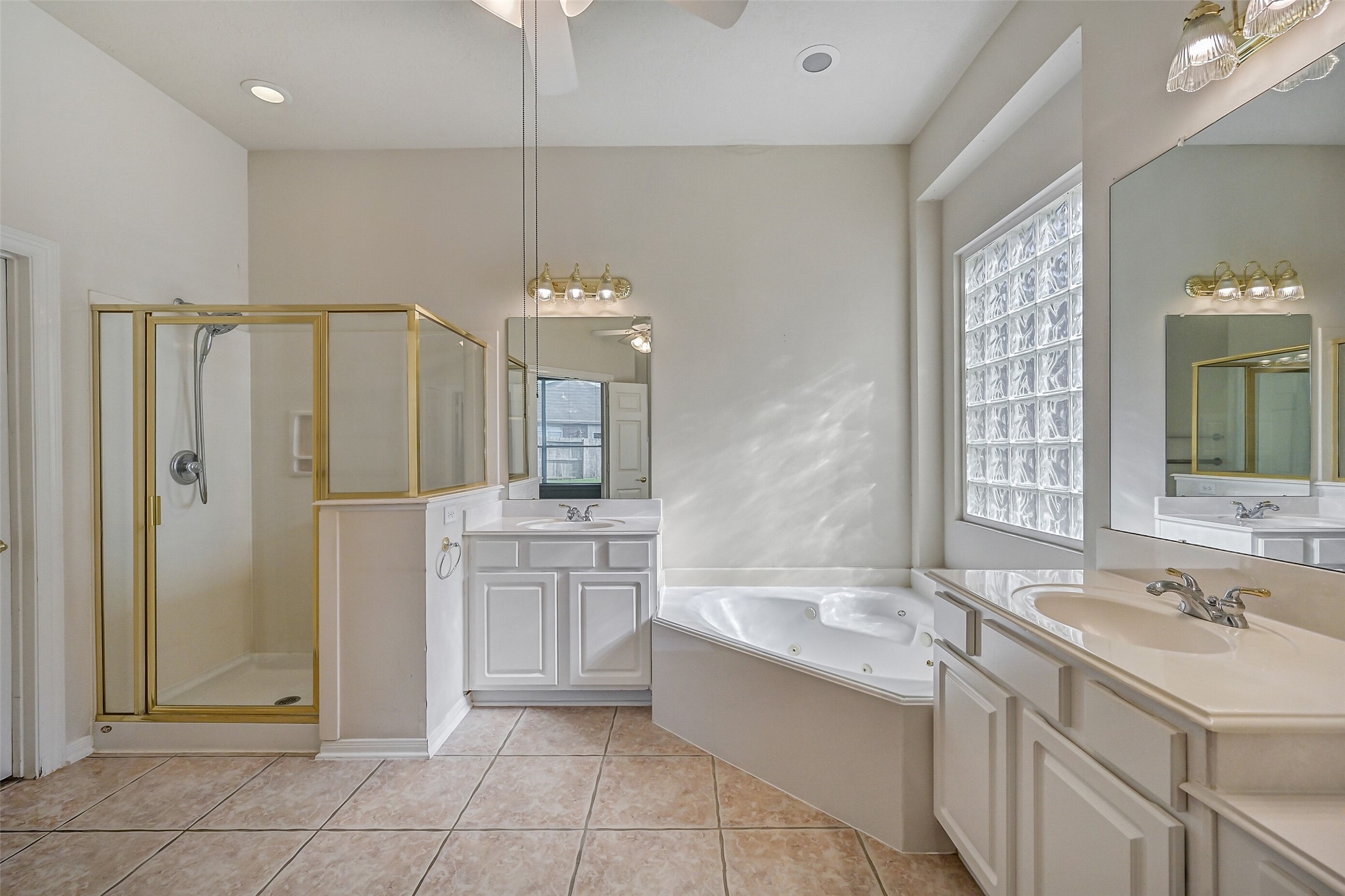1448 North Riviera Circle Pearland, TX 77581 - Photo 17 of 35 Additional view of the primary bath highlighting the spacious layout and functional design.
