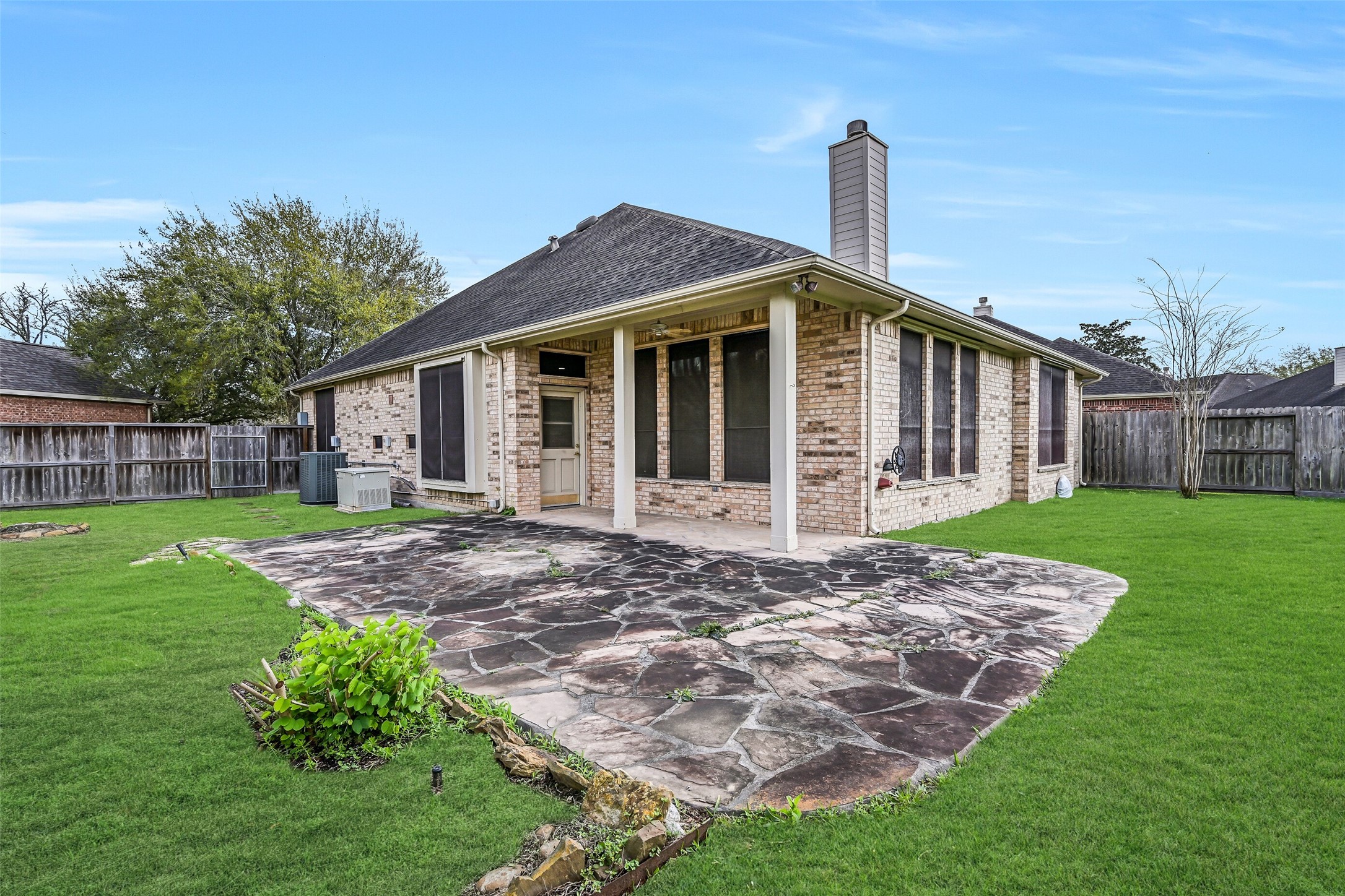1448 North Riviera Circle Pearland, TX 77581 - Photo 26 of 35 Another view of the covered patio showcasing the outdoor entertaining space.
