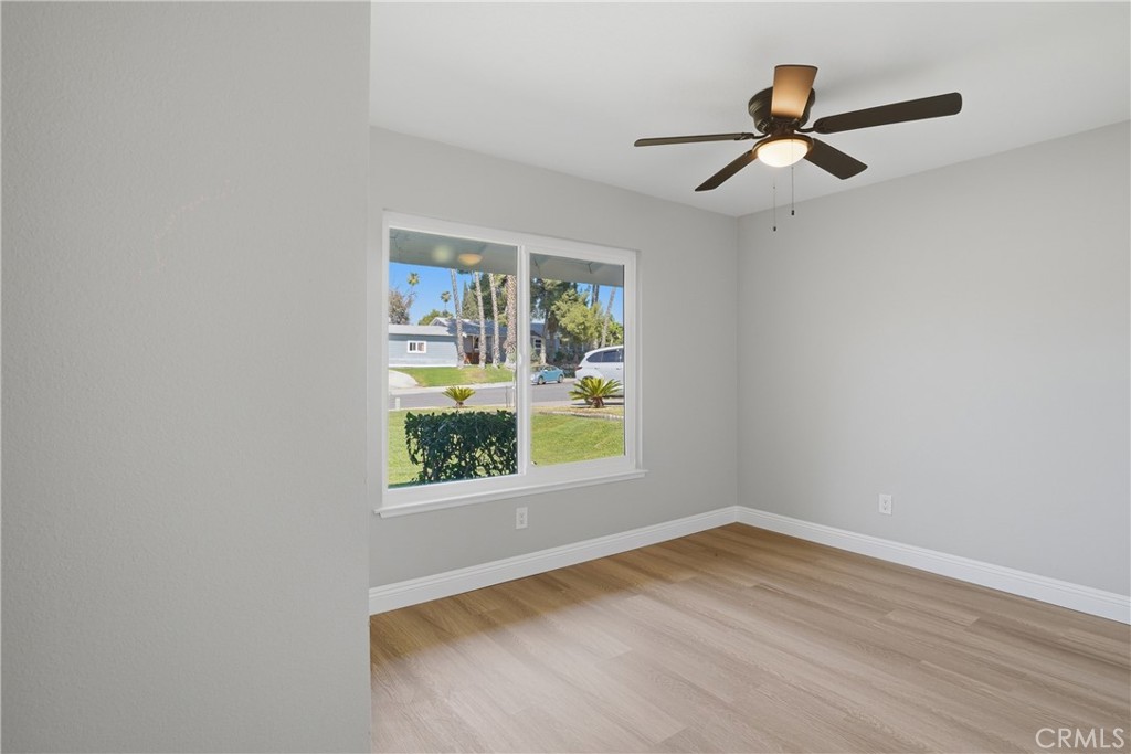 2924 Louisiana Place Riverside, CA 92506 - Photo 30 of 42 a view of a big room with wooden floor chandelier and windows