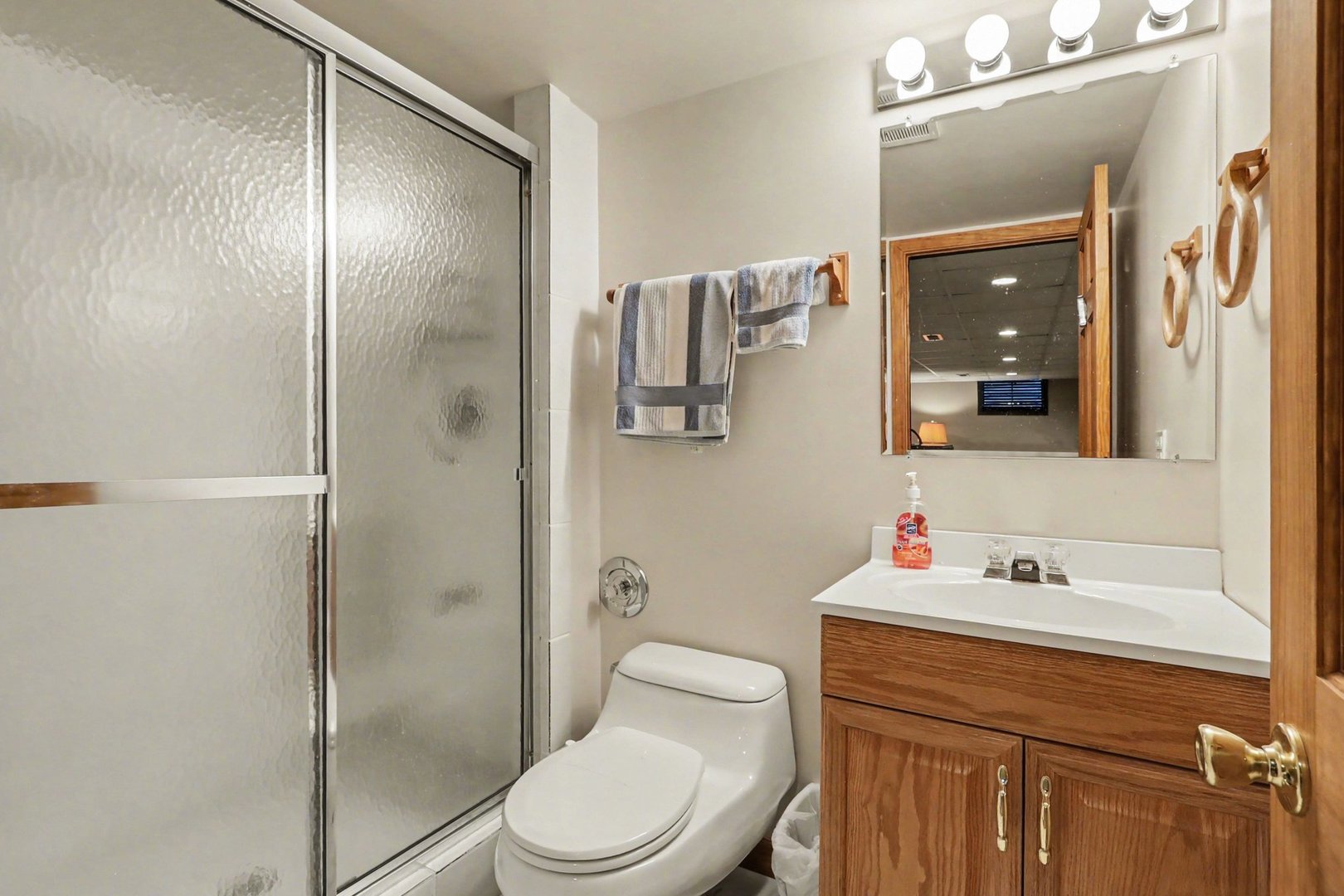 237 Homewood Drive Bolingbrook, IL 60440 - Photo 16 of 37 a bathroom with a sink a toilet and shower