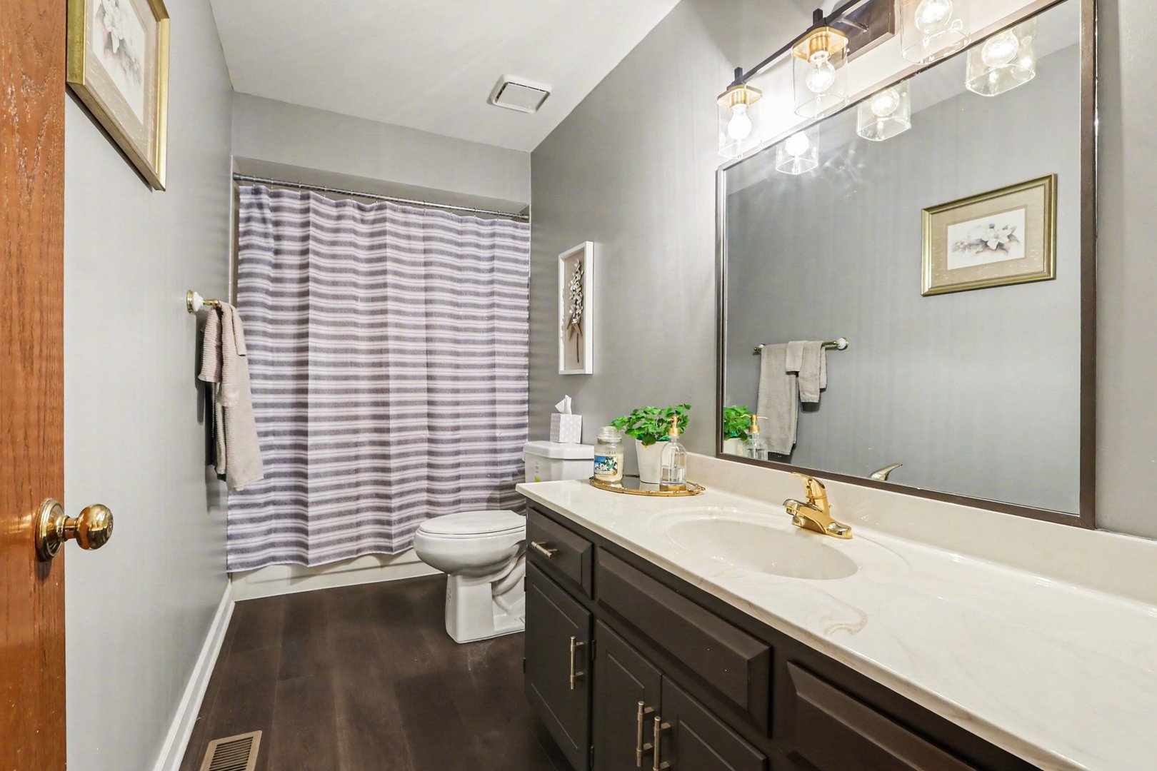 237 Homewood Drive Bolingbrook, IL 60440 - Photo 20 of 37 a bathroom with a sink a toilet and shower