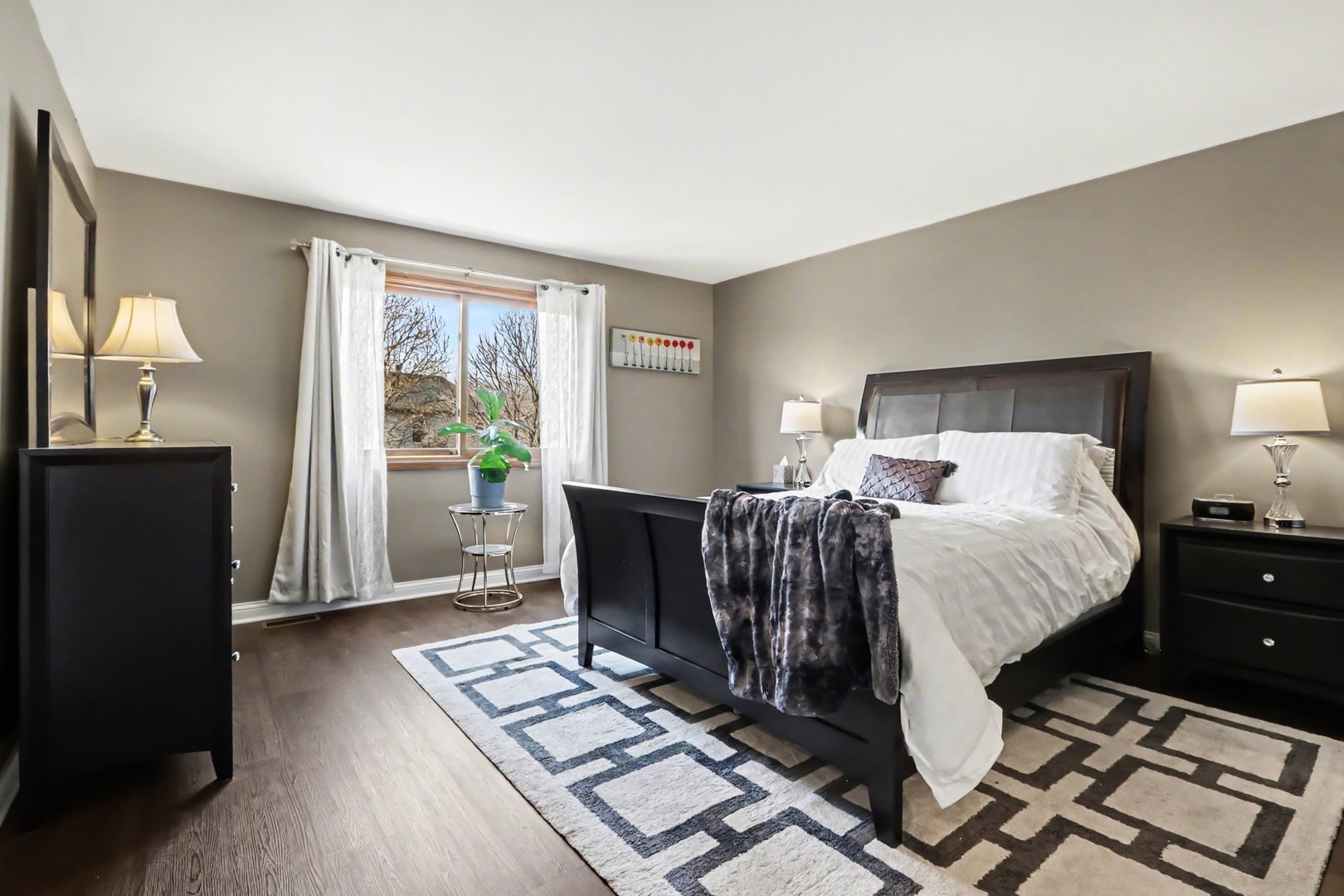 237 Homewood Drive Bolingbrook, IL 60440 - Photo 21 of 37 a bed room with a bed and a window