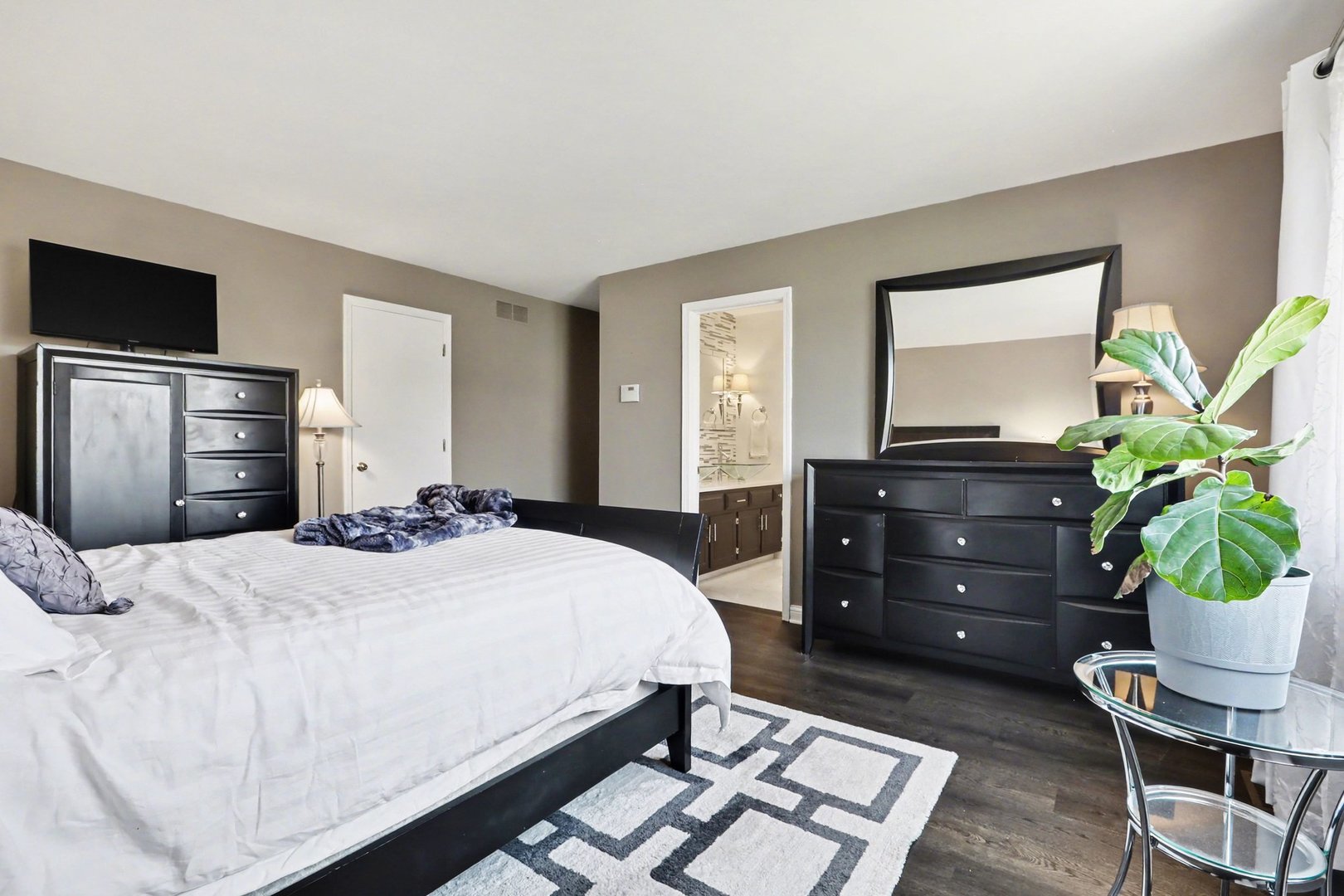 237 Homewood Drive Bolingbrook, IL 60440 - Photo 22 of 37 a bedroom with a bed and a dresser