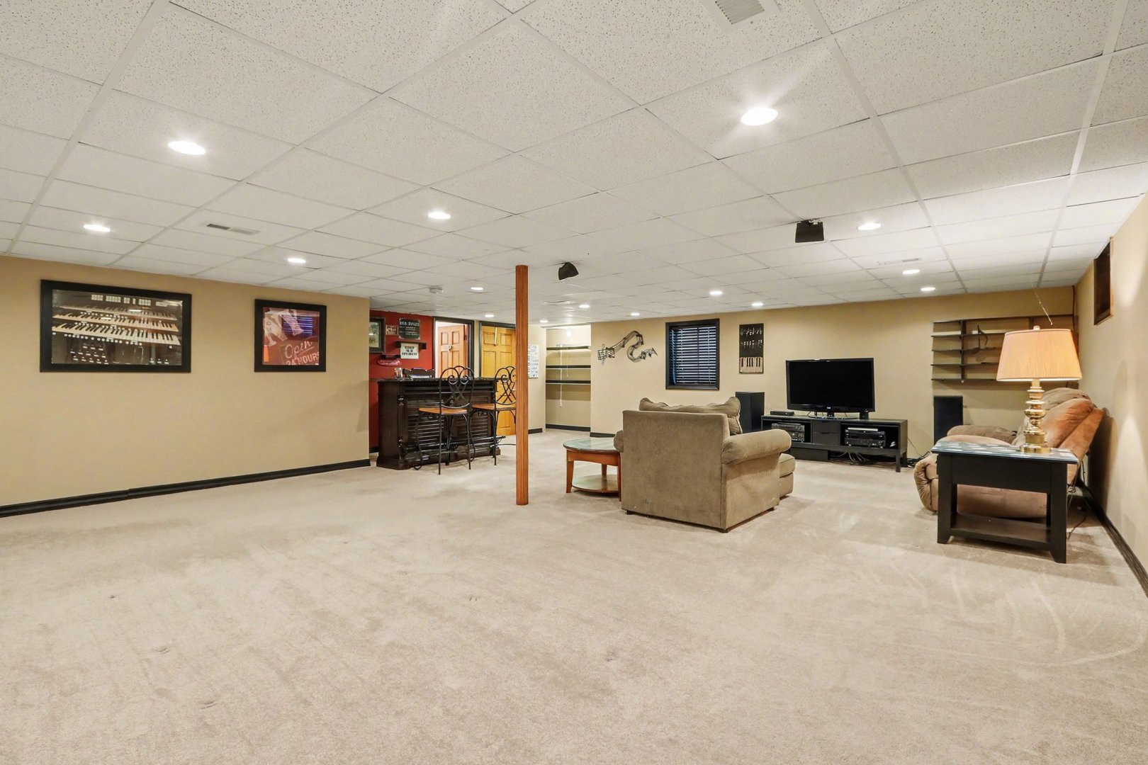 237 Homewood Drive Bolingbrook, IL 60440 - Photo 28 of 37 a living room with furniture and a flat screen tv