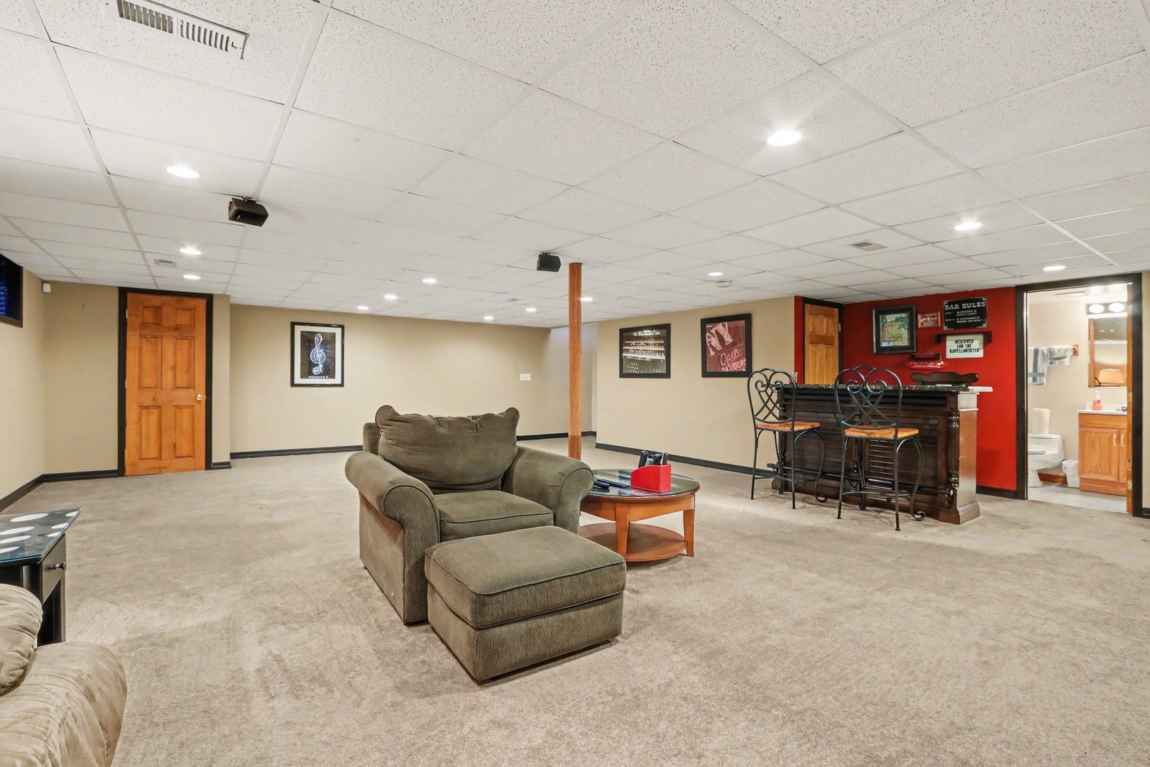 237 Homewood Drive Bolingbrook, IL 60440 - Photo 30 of 37 a living room with furniture and a flat screen tv