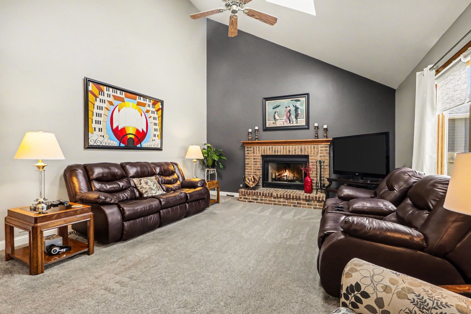 237 Homewood Drive Bolingbrook, IL 60440 - Photo 3 of 37 a living room with furniture a fireplace and a flat screen tv