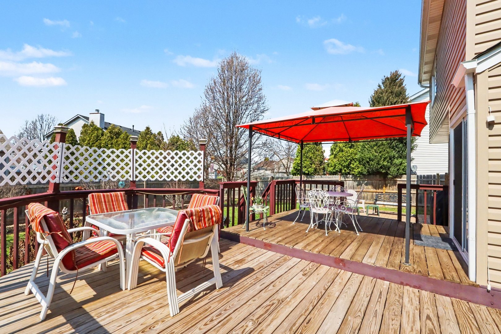 237 Homewood Drive Bolingbrook, IL 60440 - Photo 33 of 37 a view of a roof deck with a dining table and chairs