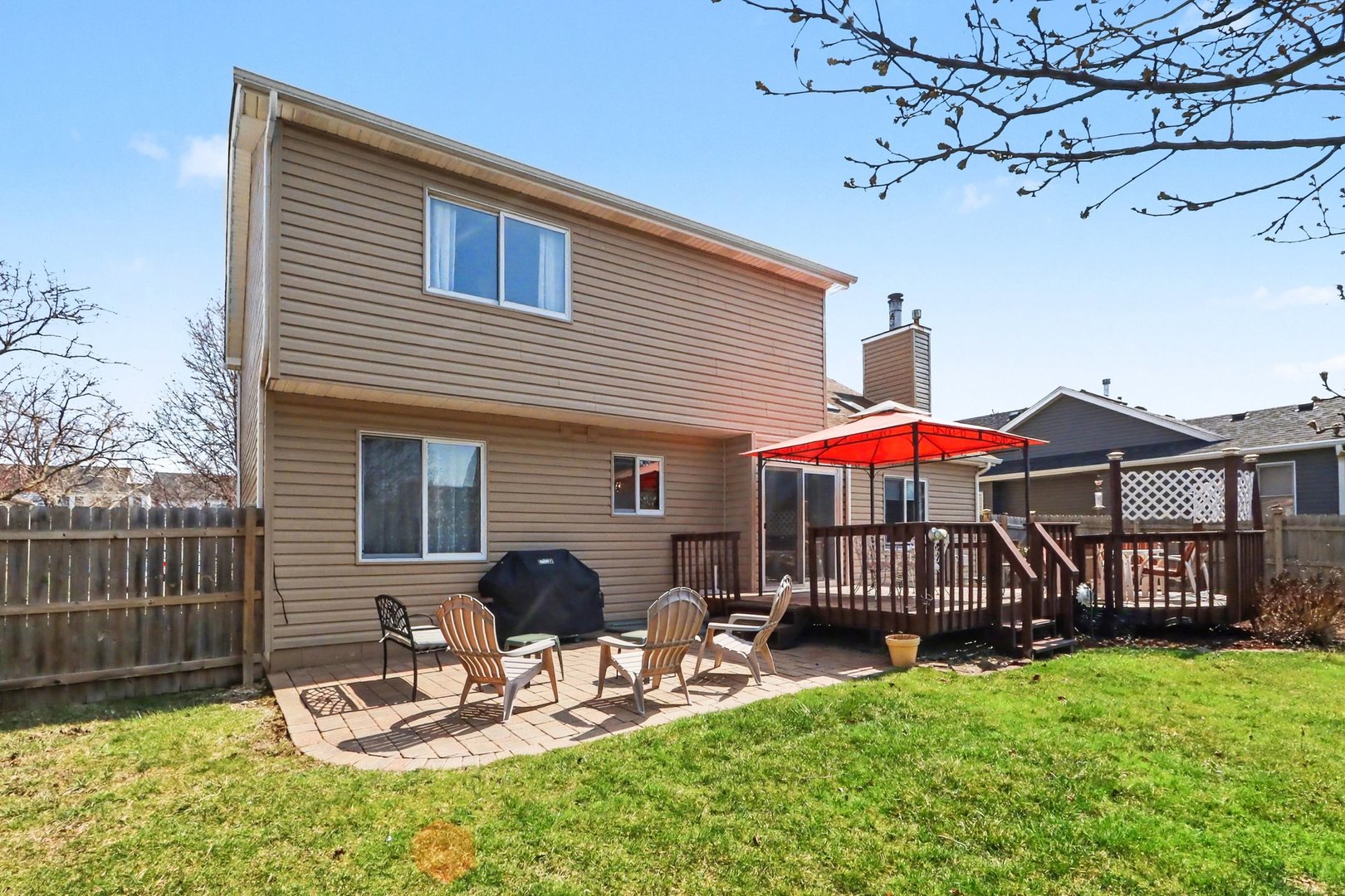 237 Homewood Drive Bolingbrook, IL 60440 - Photo 35 of 37 a view of a house with a yard and furniture