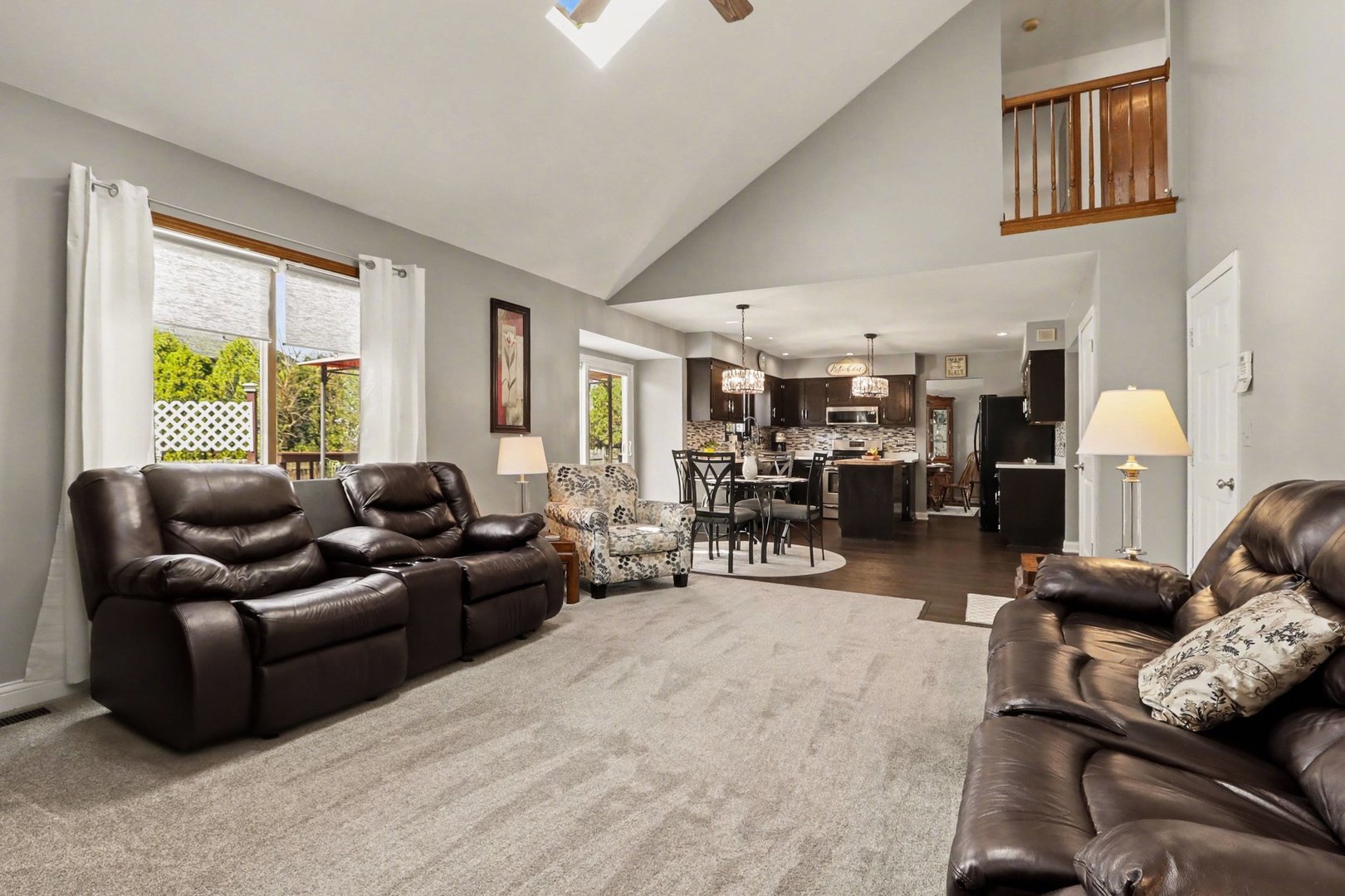 237 Homewood Drive Bolingbrook, IL 60440 - Photo 5 of 37 a living room with furniture and a large window