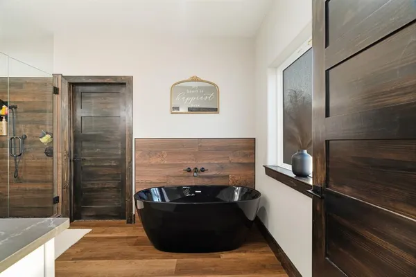 a kitchen with a refrigerator and a stove