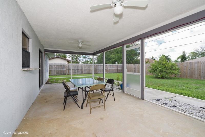 921 Southwest Bay State Road Port St. Lucie, FL 34953 - Photo 9 of 10 Screened Patio