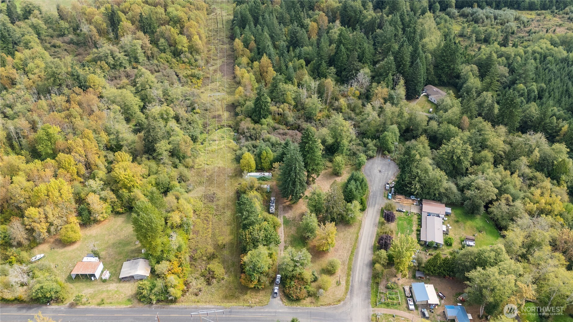 459 View Ridge Road Onalaska, WA 98570 - Photo 14 of 24 a view of a yard with plants and wooden fence