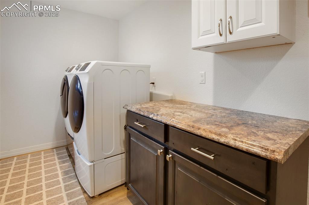 277 Aspen Circle Divide, CO 80814 - Photo 19 of 45 a utility room with washer and dryer