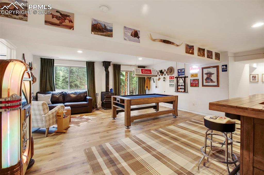 277 Aspen Circle Divide, CO 80814 - Photo 23 of 45 a living room with furniture a rug and a window