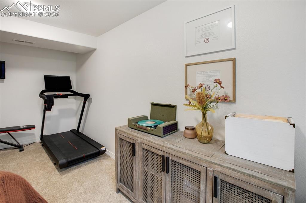 277 Aspen Circle Divide, CO 80814 - Photo 25 of 45 a living room with furniture and wooden floor