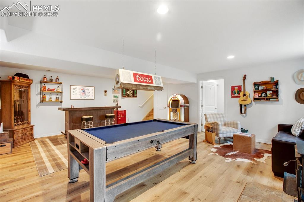 277 Aspen Circle Divide, CO 80814 - Photo 26 of 45 a living room with furniture and a flat screen tv