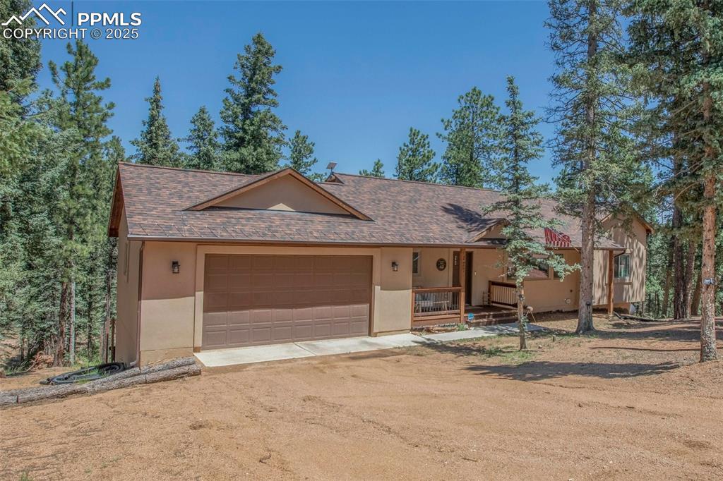 277 Aspen Circle Divide, CO 80814 - Photo 34 of 45 front view of a house with a yard