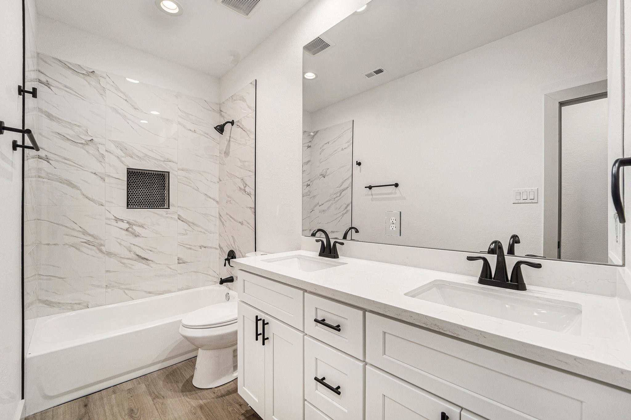 6425 Anderson Road, Unit B Houston, TX 77085 - Photo 19 of 36 a bathroom with a sink a toilet and shower