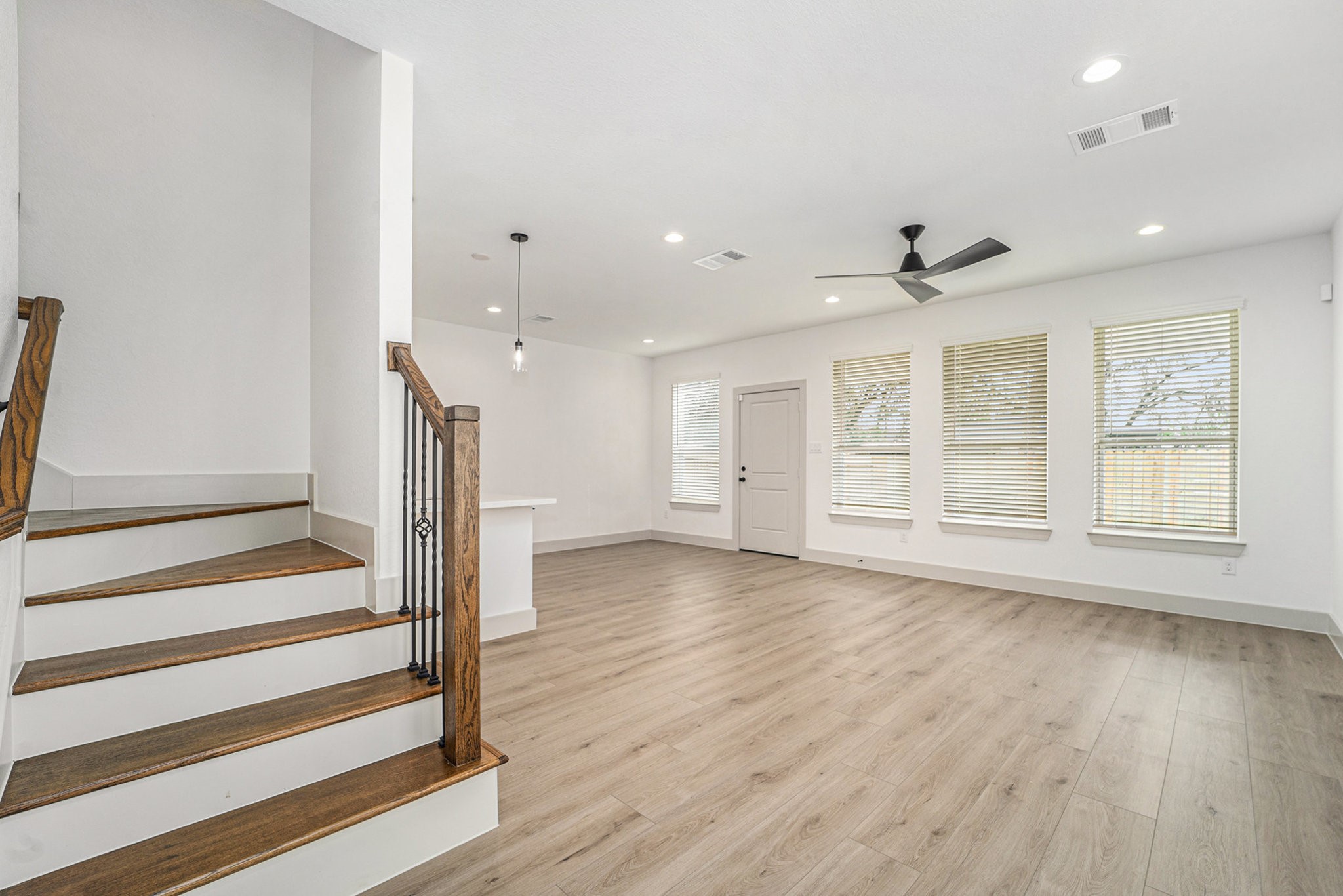 6425 Anderson Road, Unit B Houston, TX 77085 - Photo 8 of 36 a view of a livingroom with wooden floor and window