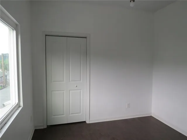an empty room with a door