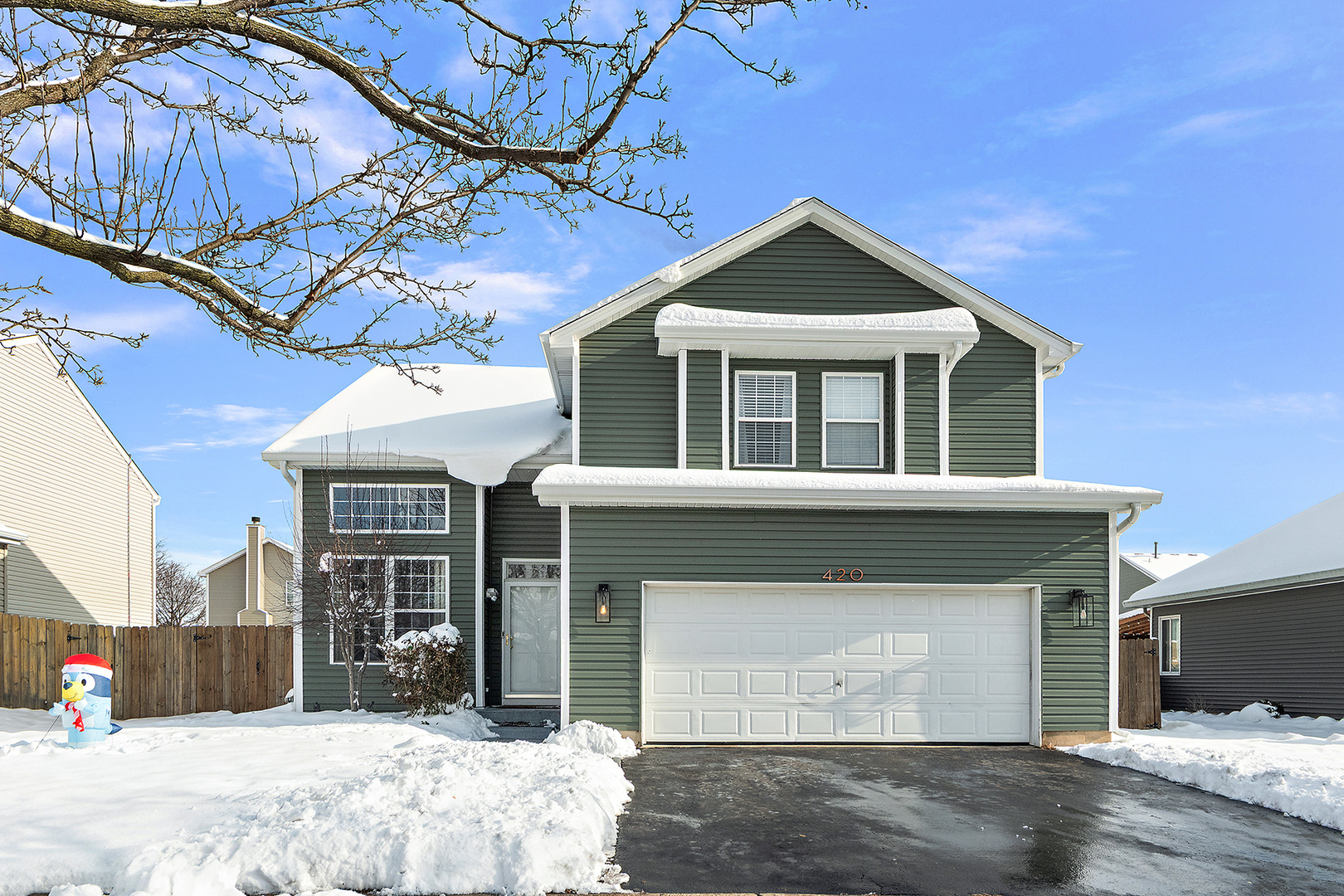 420 Wilshire Lane Bolingbrook, IL 60440 - Photo 2 of 41 a front view of a house with a yard