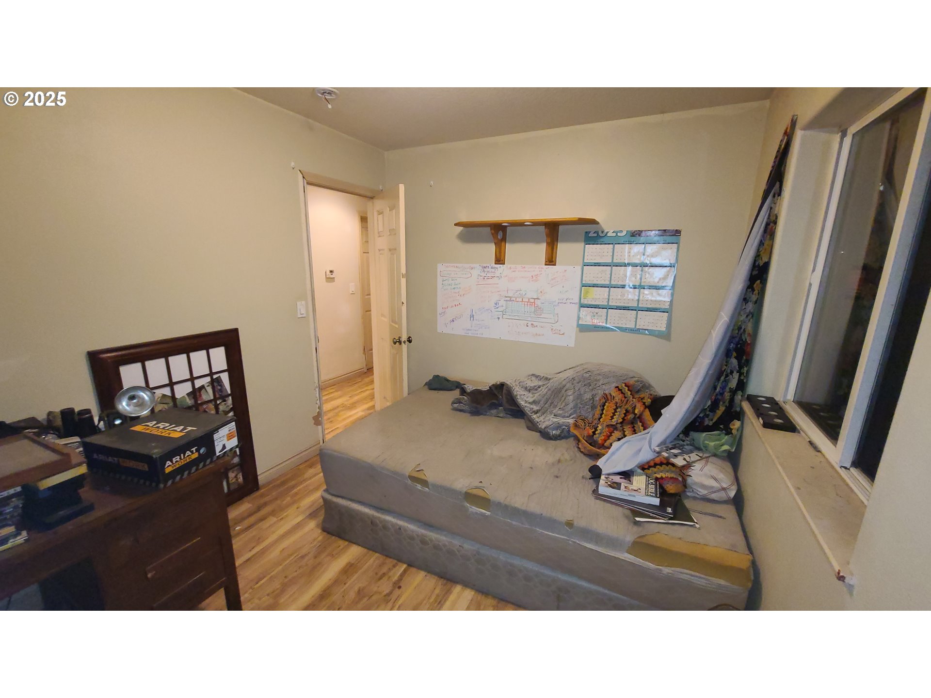 504 Wall Street Silverton, OR 97381 - Photo 3 of 12 a living room with furniture and a flat screen tv