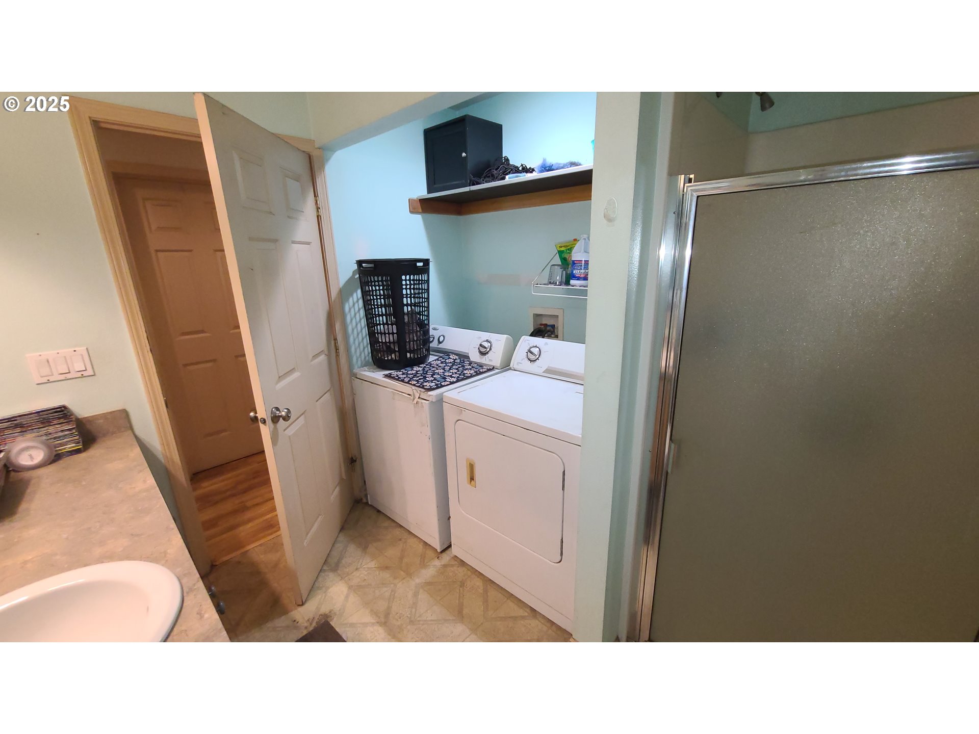 504 Wall Street Silverton, OR 97381 - Photo 7 of 12 a bathroom with a sink a mirror and a vanity