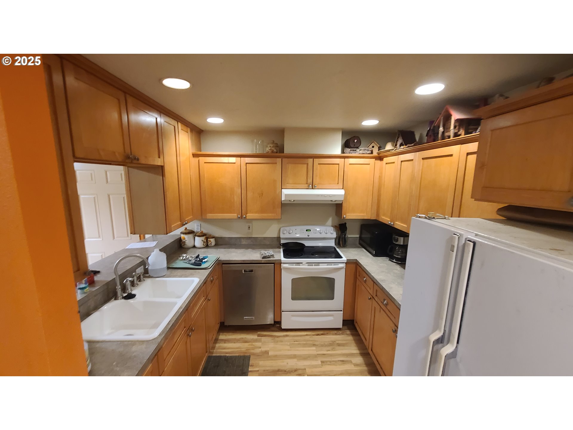 504 Wall Street Silverton, OR 97381 - Photo 9 of 12 a open kitchen with sink stove and refrigerator