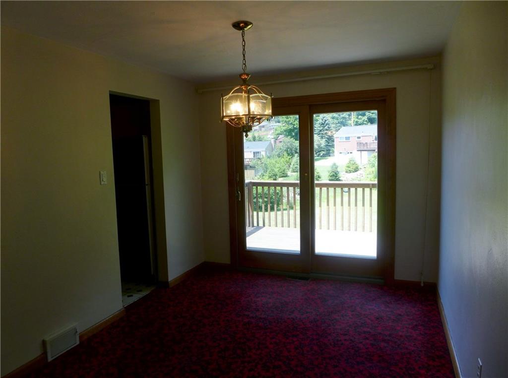 176 West Bruceton Road Pittsburgh, PA 15236 - Photo 4 of 21 Separate Dining Room with Sliding glass doors that access the deck and beautiful back yard.