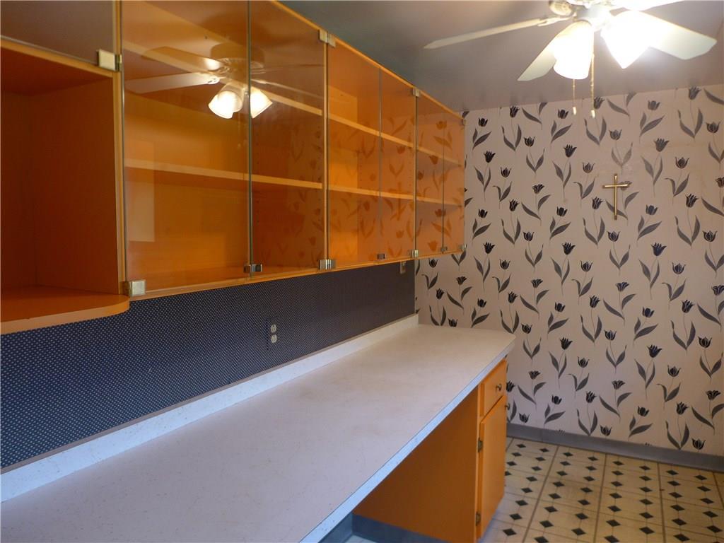 176 West Bruceton Road Pittsburgh, PA 15236 - Photo 5 of 21 Beautiful glass door cabinets in this galley kitchen with lots of counter space!
