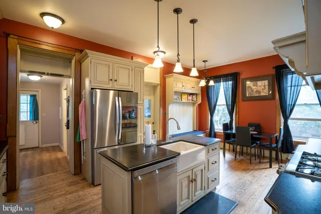 a room with gym equipment and large window