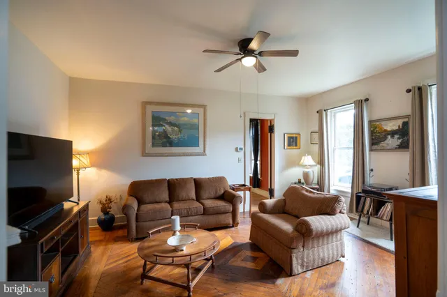 a bedroom with a bed and flat screen tv