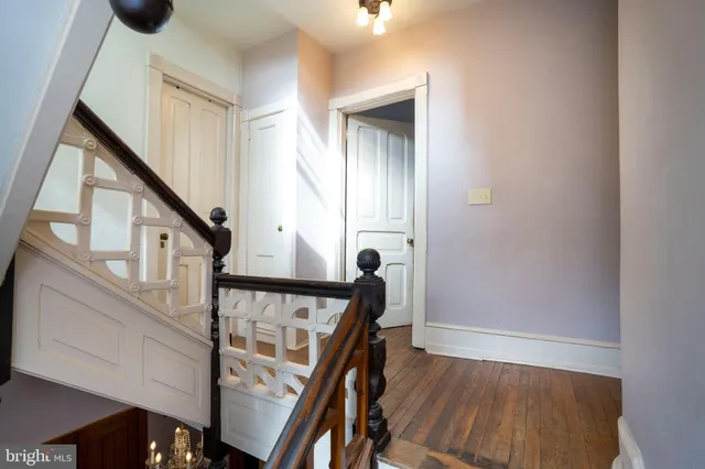 a bath room with a sink and a mirror