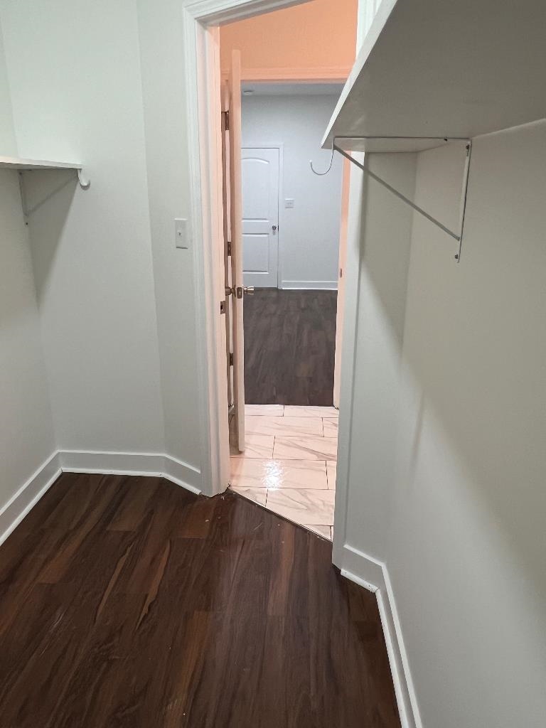 4566 Independent Road Bartlett, TN 38002 - Photo 17 of 24 a view of hallway with wooden floor