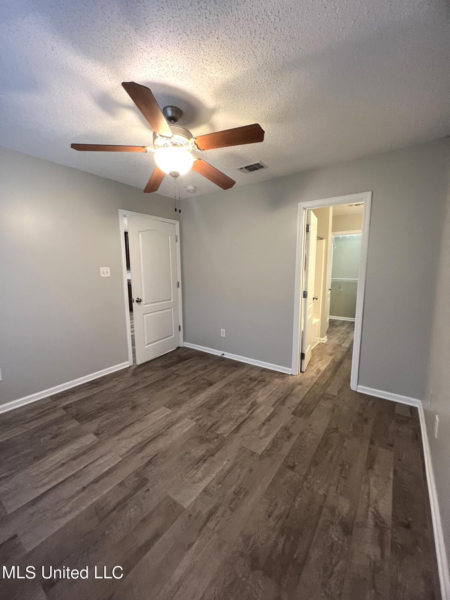 4 Ivy Cove, Unit B McHenry, MS 39561 - Photo 12 of 16 4 Ivy Cv Primary Bedroom