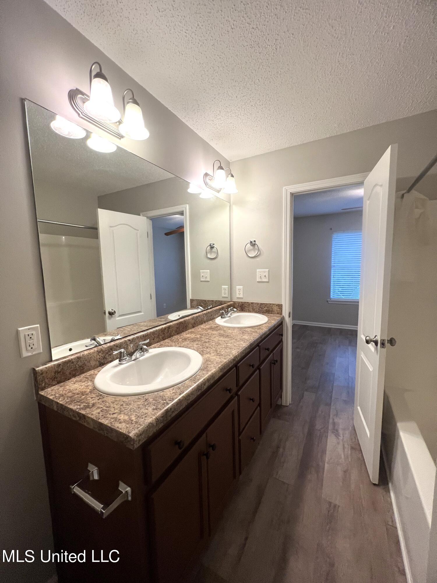 4 Ivy Cove, Unit B McHenry, MS 39561 - Photo 13 of 16 4 Ivy Cv Primary Bath