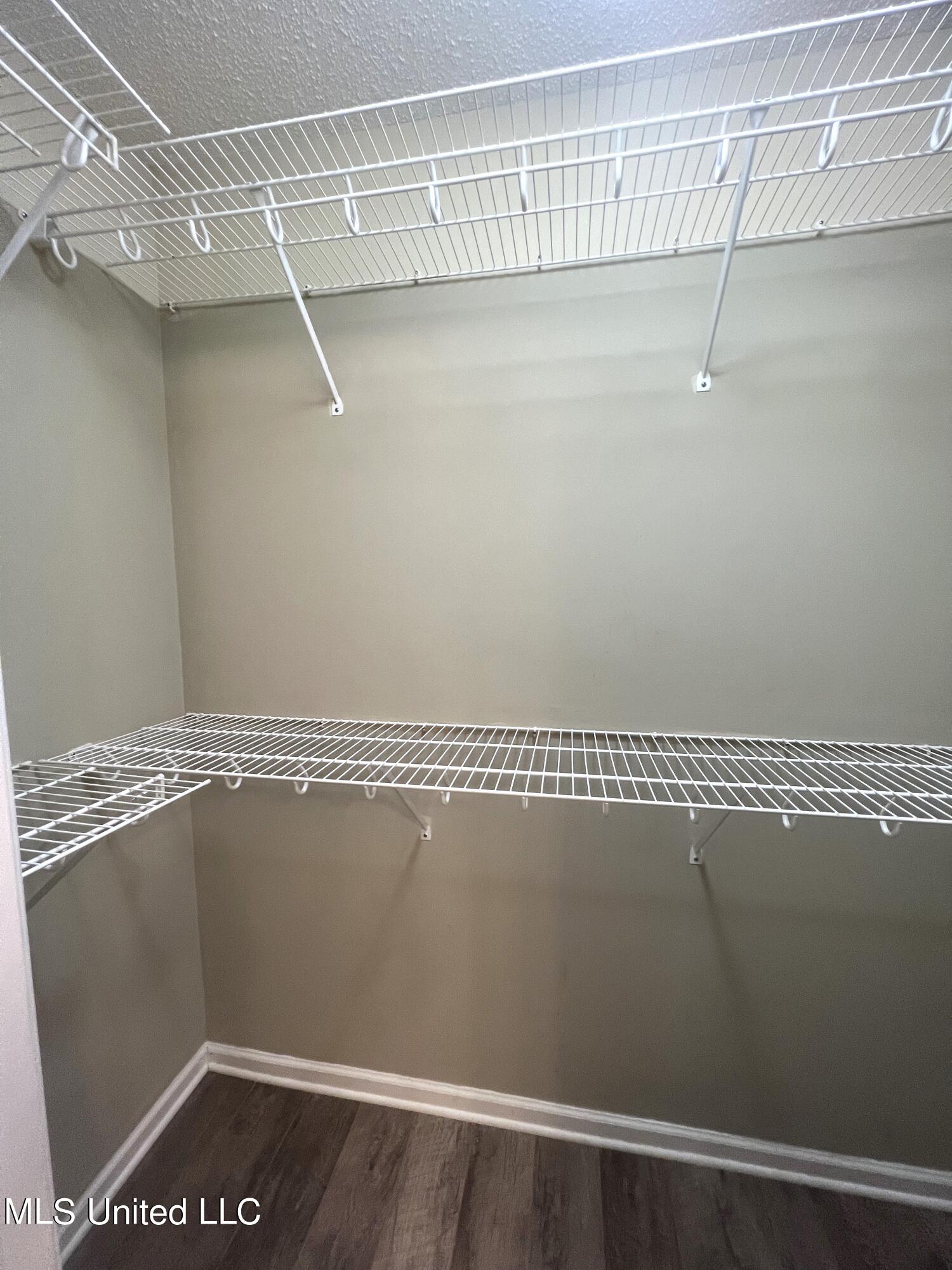 4 Ivy Cove, Unit B McHenry, MS 39561 - Photo 15 of 16 4 Ivy Cv Primary Closet