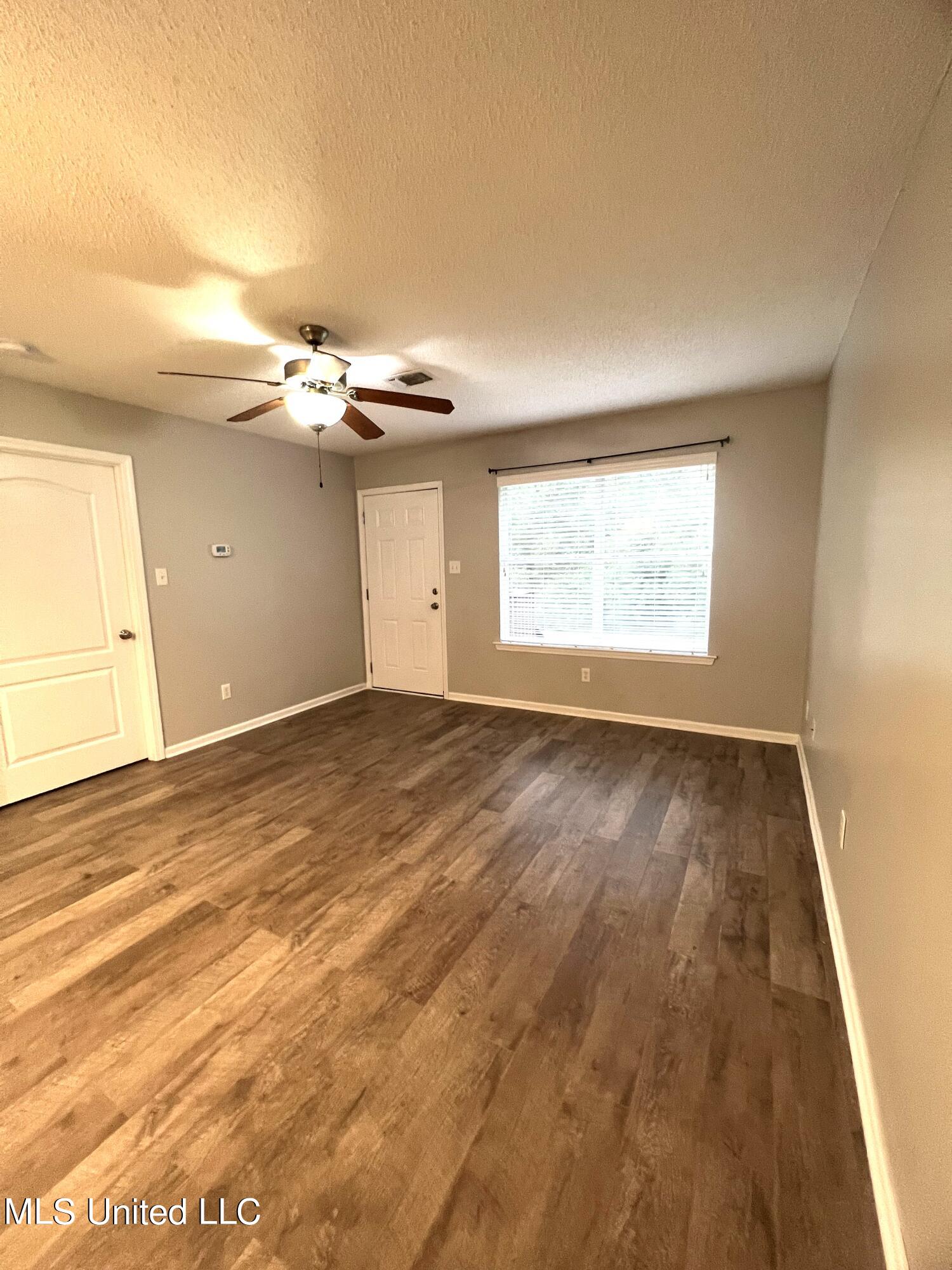 4 Ivy Cove, Unit B McHenry, MS 39561 - Photo 2 of 16 4 Ivy Cv Living