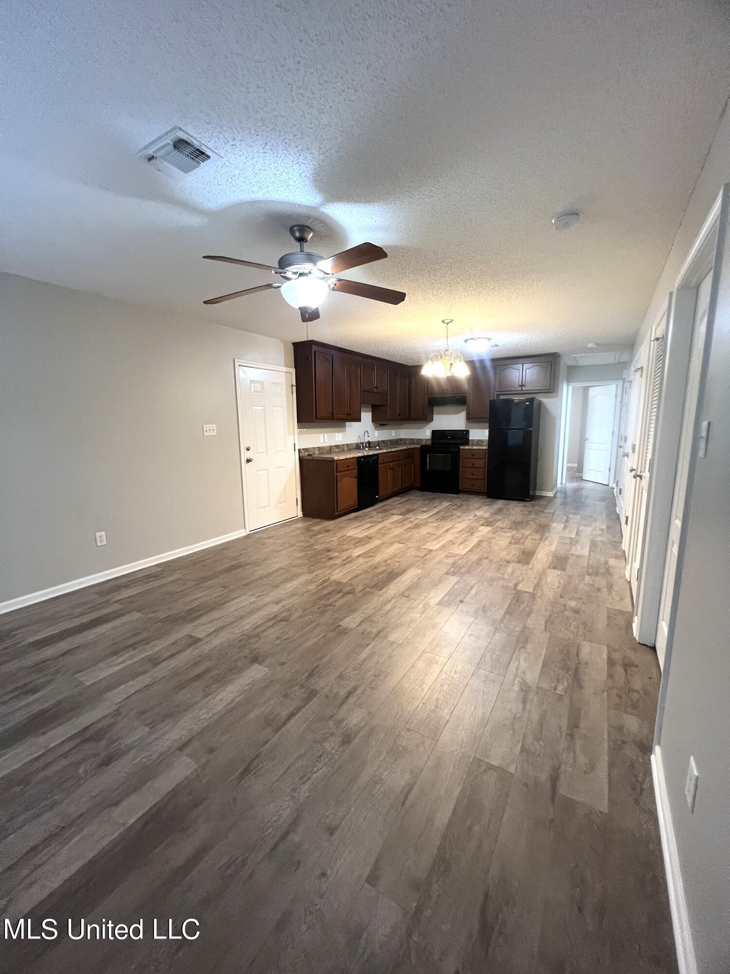 4 Ivy Cove, Unit B McHenry, MS 39561 - Photo 3 of 16 4 Ivy Cv Livingroom