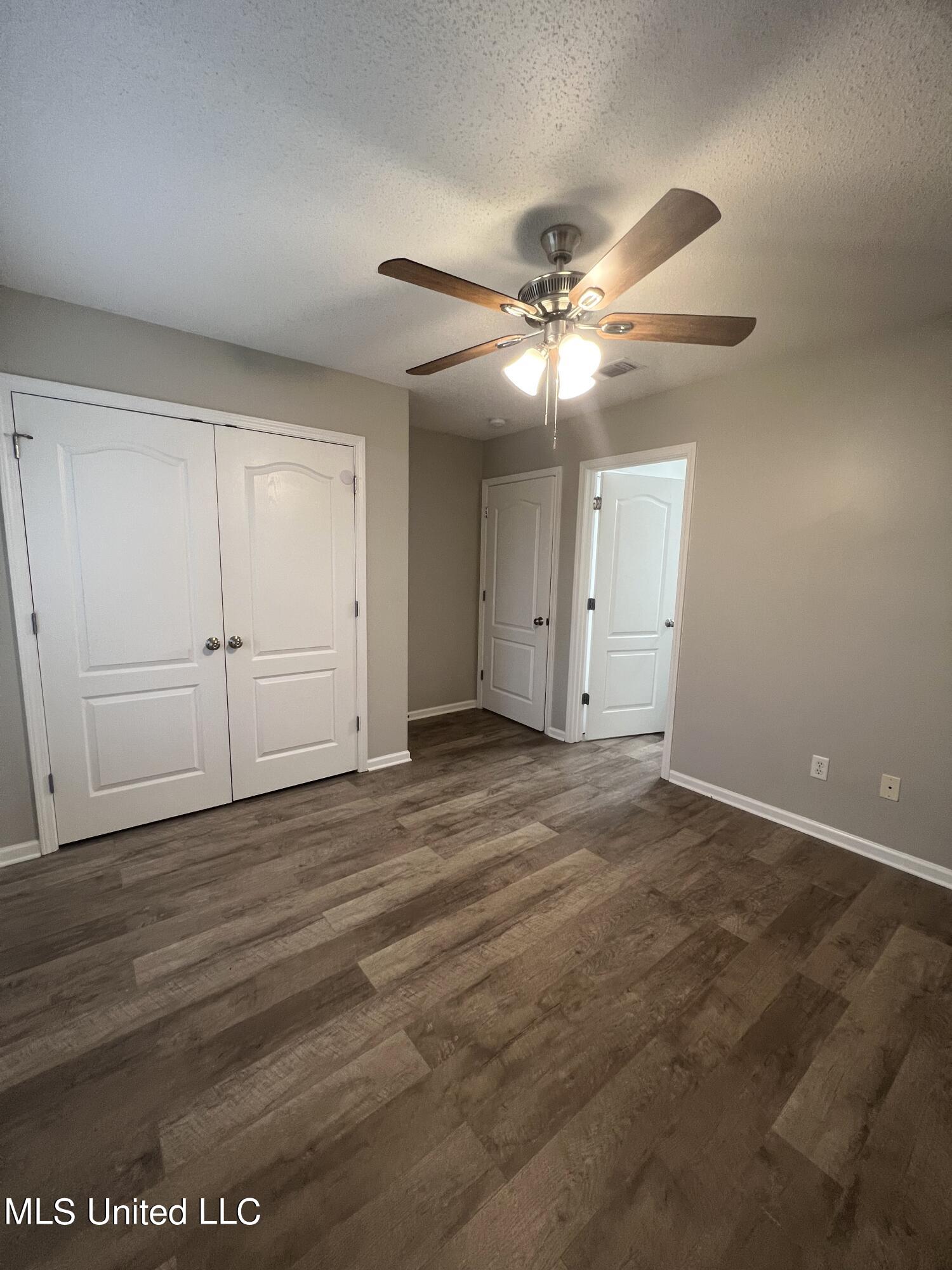 4 Ivy Cove, Unit B McHenry, MS 39561 - Photo 8 of 16 4 Ivy Cv Guest Bedroom
