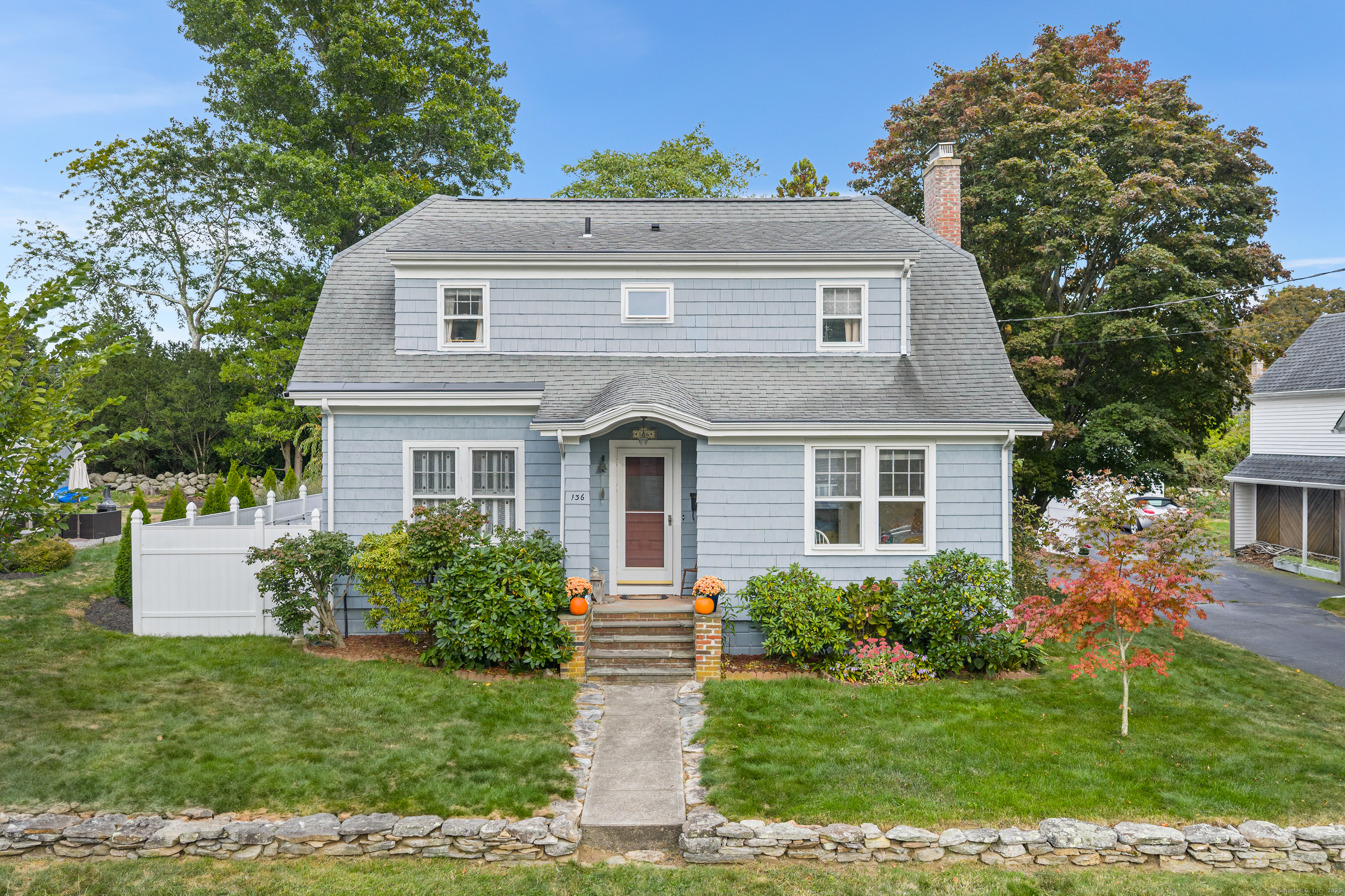 136 Ocean View Avenue Groton, CT 06355 - Photo 1 of 1 a front view of a house with a yard