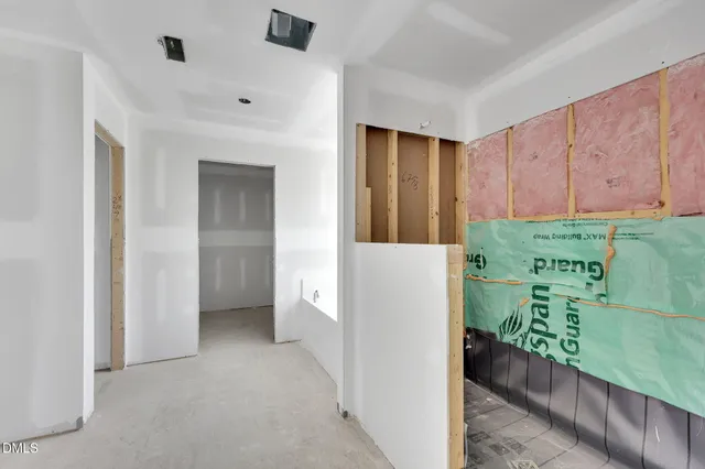 a view of a hallway with closet
