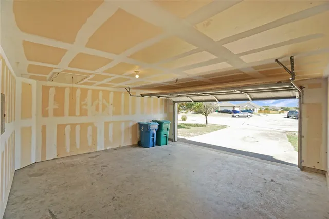 a view of backyard with cabin