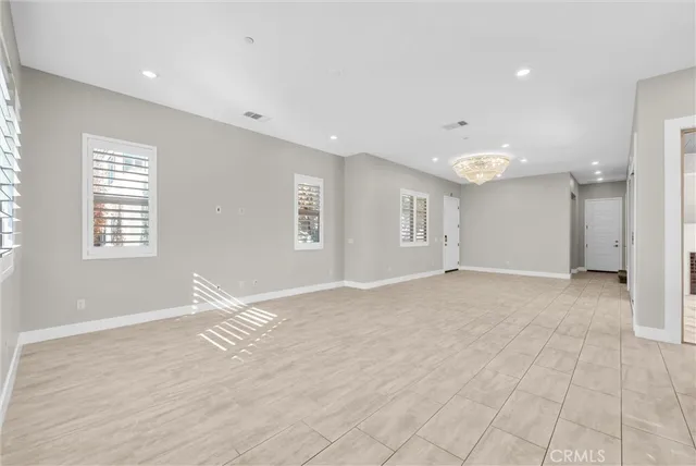 a kitchen with stainless steel appliances kitchen island granite countertop a sink and cabinets