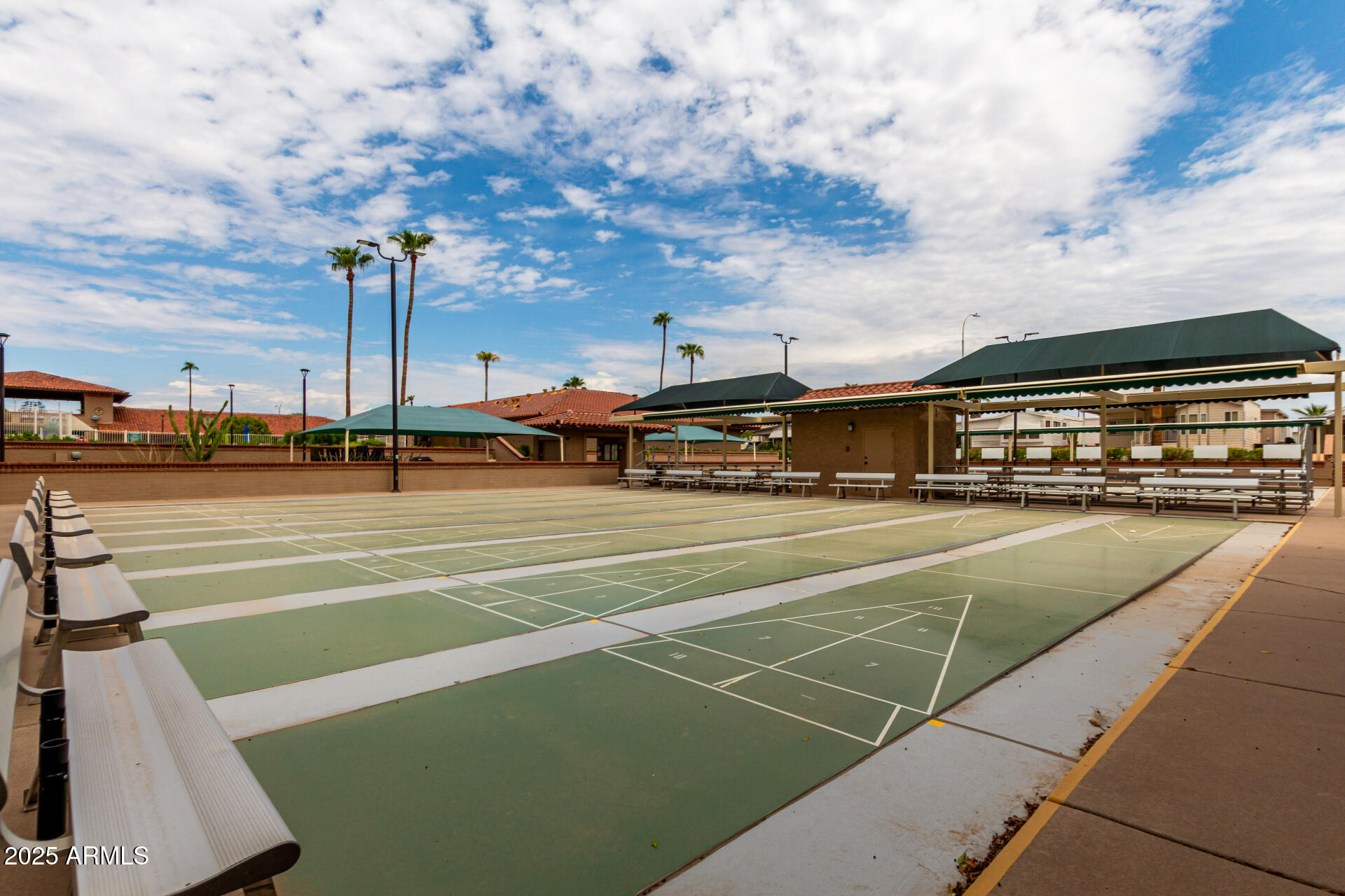 111 South Greenfield Road, Unit 480 Mesa, AZ 85206 - Photo 24 of 29 a view of an outdoor space and tennis court